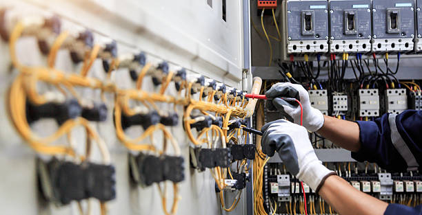 Professional Electrician technician working in Richmond Heights, MO